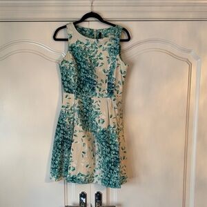 Leafy Green Sleeveless Mini Dress with Pockets!
